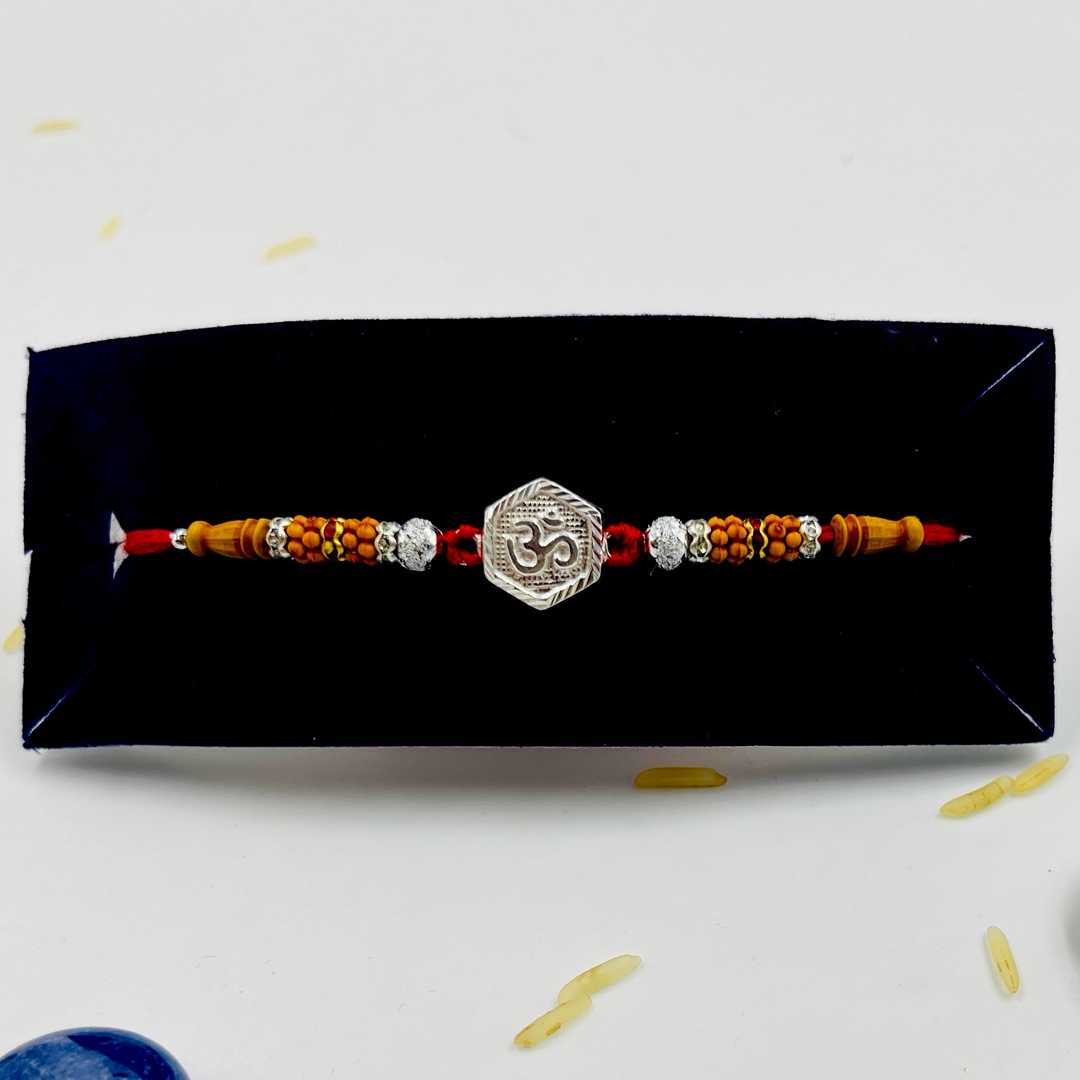 Silver Om Rakhi for Bhaiya 0