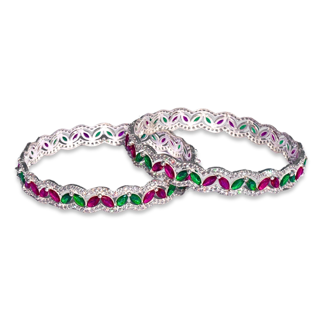 Silver Bangles Adorned with Pink and Green Gemstones 0