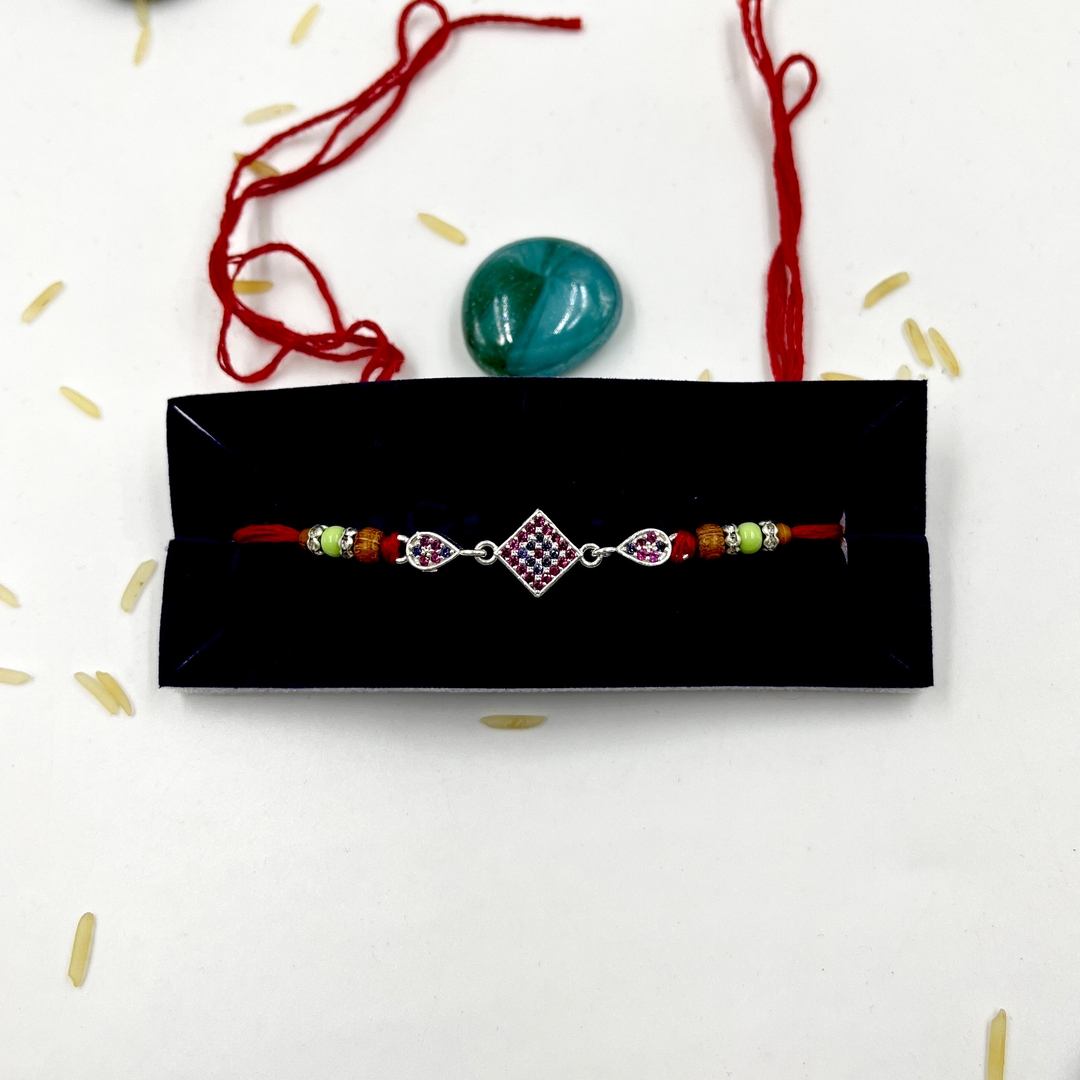 Silver Rakhi with Pink Gemstones and Colorful Beads 0