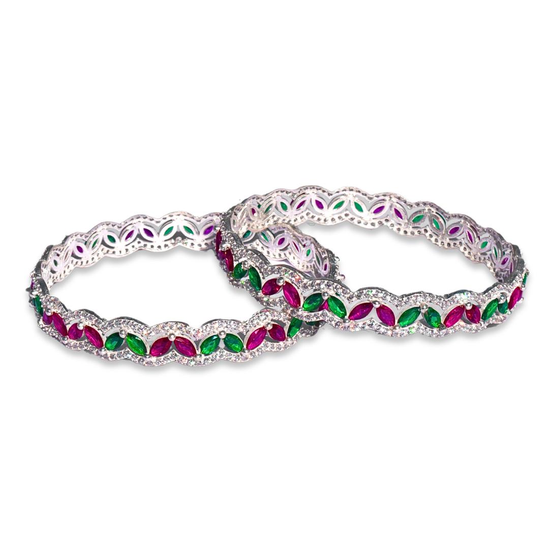 Silver Bangles Adorned with Pink and Green Gemstones 0