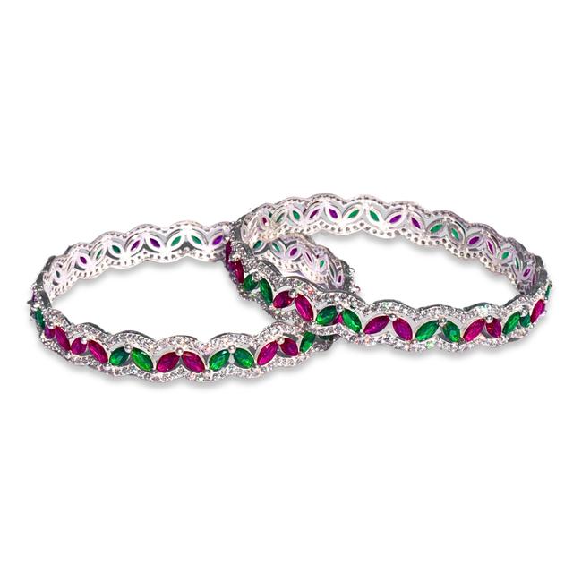 Silver Bangles Adorned with Pink and Green Gemstones