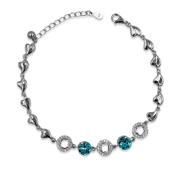 Silver Solitaire Blue Topaz Adjustable Bracelet